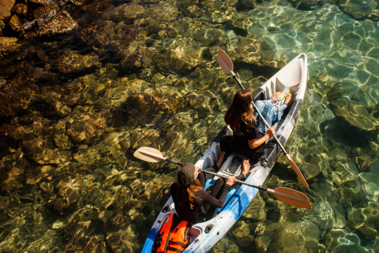 Volunteers on kayak for turtle survey